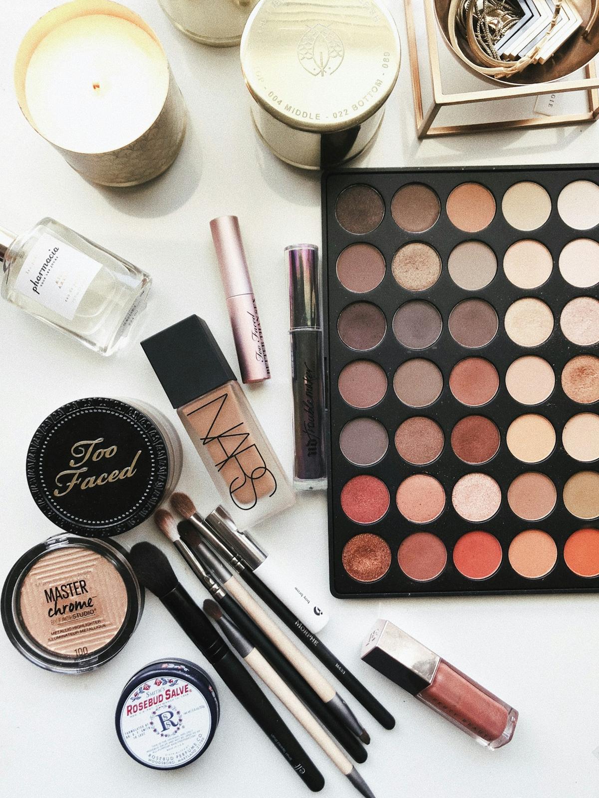 Professional makeup kit with palettes, foundation and brushes